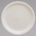A Homer Laughlin ivory china plate with a narrow white rim.
