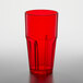 A red plastic GET Bahama tumbler on a white surface.