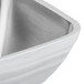 A pearl white Vollrath double wall square metal bowl.