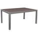 A BFM Seating standard height table with a gray synthetic teak top and gray metal legs.