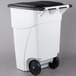 A white Rubbermaid rectangular trash can with black wheels.