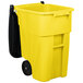 A yellow Rubbermaid commercial trash can with black wheels.