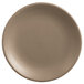 A close-up of a Libbey Driftstone Sand Satin Matte coupe plate with a white background.
