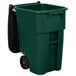 A green Rubbermaid commercial trash can with black wheels.