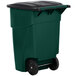 A green Rubbermaid commercial trash can with wheels and a black lid.