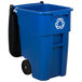 A blue Rubbermaid recycling bin with black wheels.