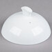A white Libbey porcelain casserole dish lid with a small handle.