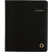 A black At-A-Glance monthly planner with a recycle symbol on it.