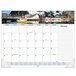 An At-A-Glance seascape panoramic desk pad calendar with a boat in the water.