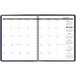 A navy blue At-A-Glance monthly planner page with white numbers and a grid.