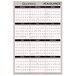 An At-A-Glance quarterly wall planner with red and black text on a white background.