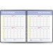 An At-A-Glance spiral bound black QuickNotes academic planner open to a weekly schedule page.