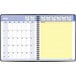 A spiral bound At-A-Glance planner with a yellow and black calendar page.