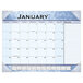 An At-A-Glance desk pad calendar with white paper and black text.
