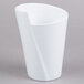 A white Elite Global Solutions melamine crock with a curved edge.