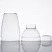Three clear plastic containers with clear lids.