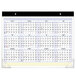 An At-A-Glance desk pad calendar with white numbers and days on a black background.