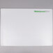 A white rectangular cutting board with green WebstaurantStore logo.