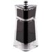 A black and clear Chef Specialties Kate salt/pepper mill with a silver and black lid.