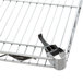 A Metro Super Erecta wire shelf with a metal clip.