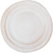An off white Elite Global Solutions Della Terra melamine plate with a circular rim.
