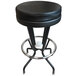 A black stool with a round seat and a round white Michigan State University logo on the base.