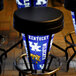 A Holland Bar Stool with a black seat and the University of Kentucky Wildcats logo on it.