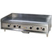 An Anets stainless steel countertop griddle with manual controls.