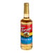 A Torani Butter Rum Flavoring Syrup 750 mL glass bottle.