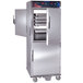 A stainless steel Cres Cor Pass-Through Roast-N-Hold convection oven with trays.