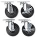 A set of four black Vollrath swivel casters with black rubber wheels.