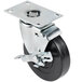 A metal plate with four black and silver Vollrath caster wheels.