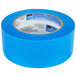 A roll of 3M ScotchBlue™ blue painter's tape with a label.