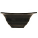 A black ribbed porcelain bowl with a curved edge.