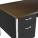 A walnut and black Alera double pedestal steel desk with two drawers.