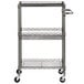 A black metal Alera wire rolling cart with three shelves on wheels.