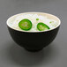 A bowl of rice noodles with jalapenos and green onions in an Elite Global Solutions two-tone melamine bowl.