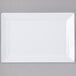 An Elite Global Solutions white rectangular melamine plate with a plain edge.