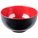 A black and red Elite Global Solutions Karma melamine bowl with a white interior.
