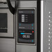 A TurboChef electric countertop oven with a digital display.
