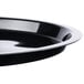 A close-up of a Fineline black plastic catering tray with a high rim.
