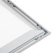 An Aarco aluminum slide frame for a white board.