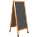 A wooden A-Frame sign with a black chalkboard.