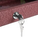 The key holder with two keys unlocks the Aarco Rosewood plastic lumber message center.