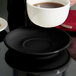 Tuxton BBE-066 6 3/4" Cappuccino China Saucer - Black - 24/Case Main Thumbnail 1