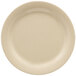A close-up of a GET Tahoe Sandstone plate in beige.