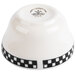 A creamy white Homer Laughlin bouillon cup with black and white checkered designs.