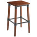 A Lancaster Table & Seating backless bar stool with a metal frame and legs.