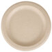 A white round Eco-Products wheat straw plate with a circular design.