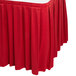 A red Snap Drape table skirt with pleats.